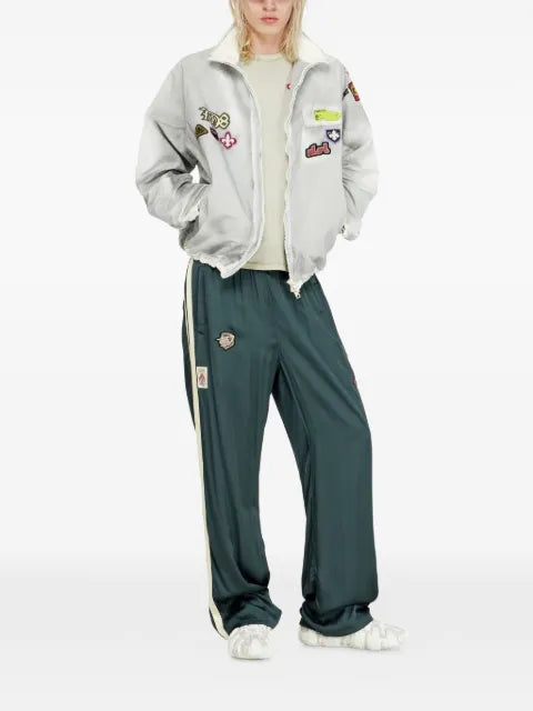 Diesel windbreaker with trompe l’oeil patches